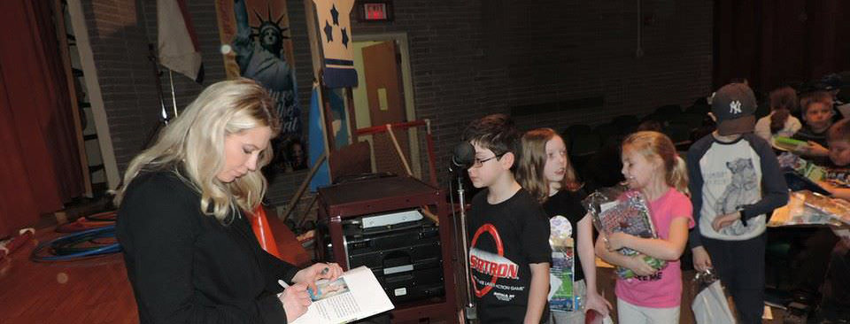 roselyn kasmire with children and books